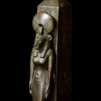An Egyptian Bronze Lion-Headed Goddess and Obelisk