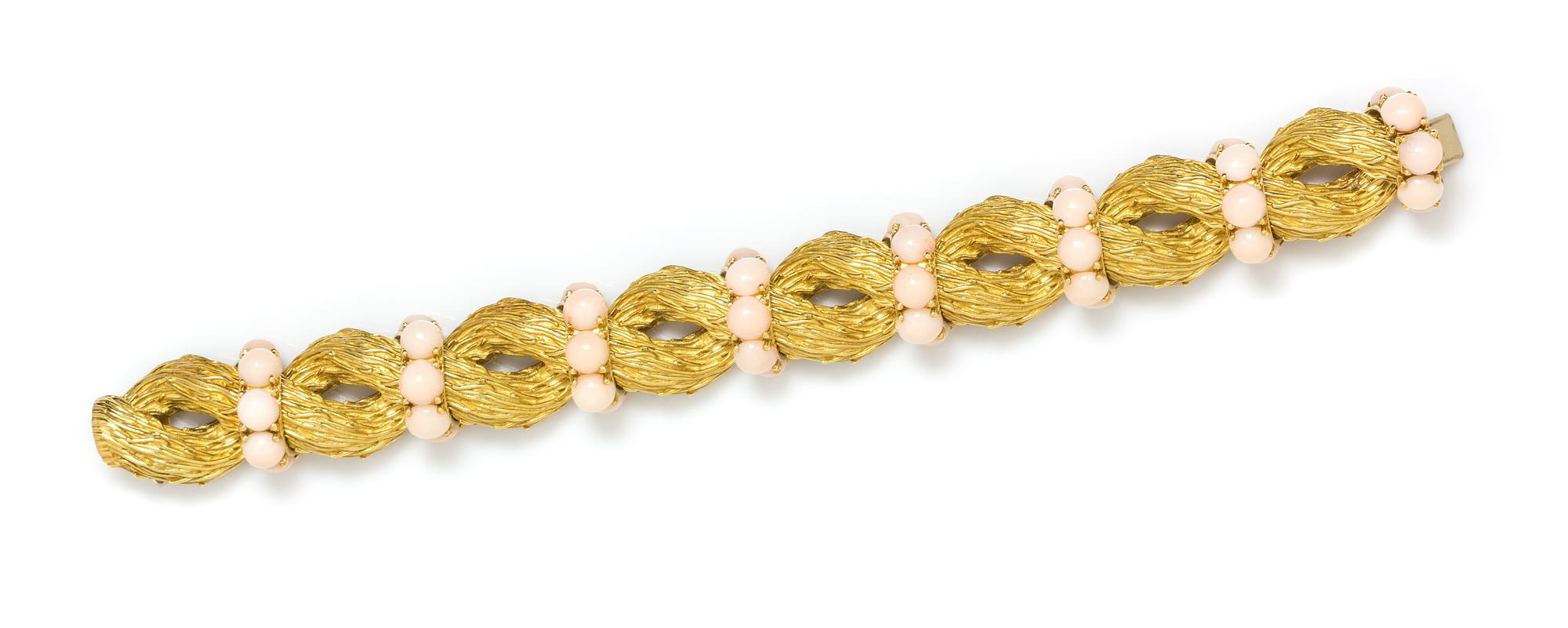 An 18 Karat Yellow Gold and Angel Skin Coral Bracelet, 73.45 dwts.