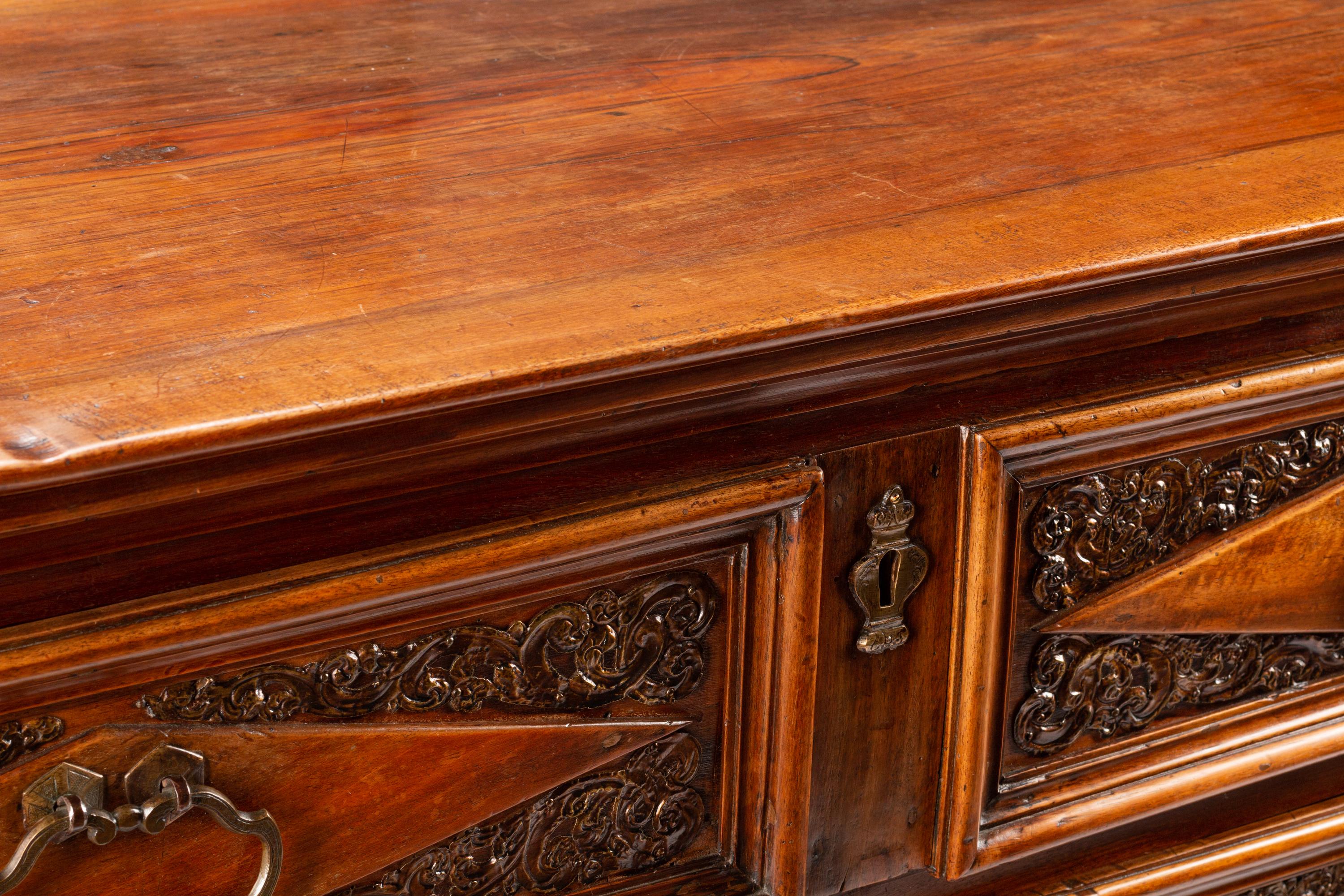 An Italian Baroque Style Walnut Chest of Drawers