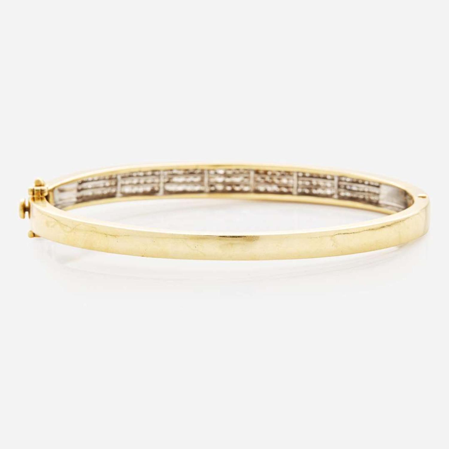 A 14K Yellow Gold and Diamond Bangel