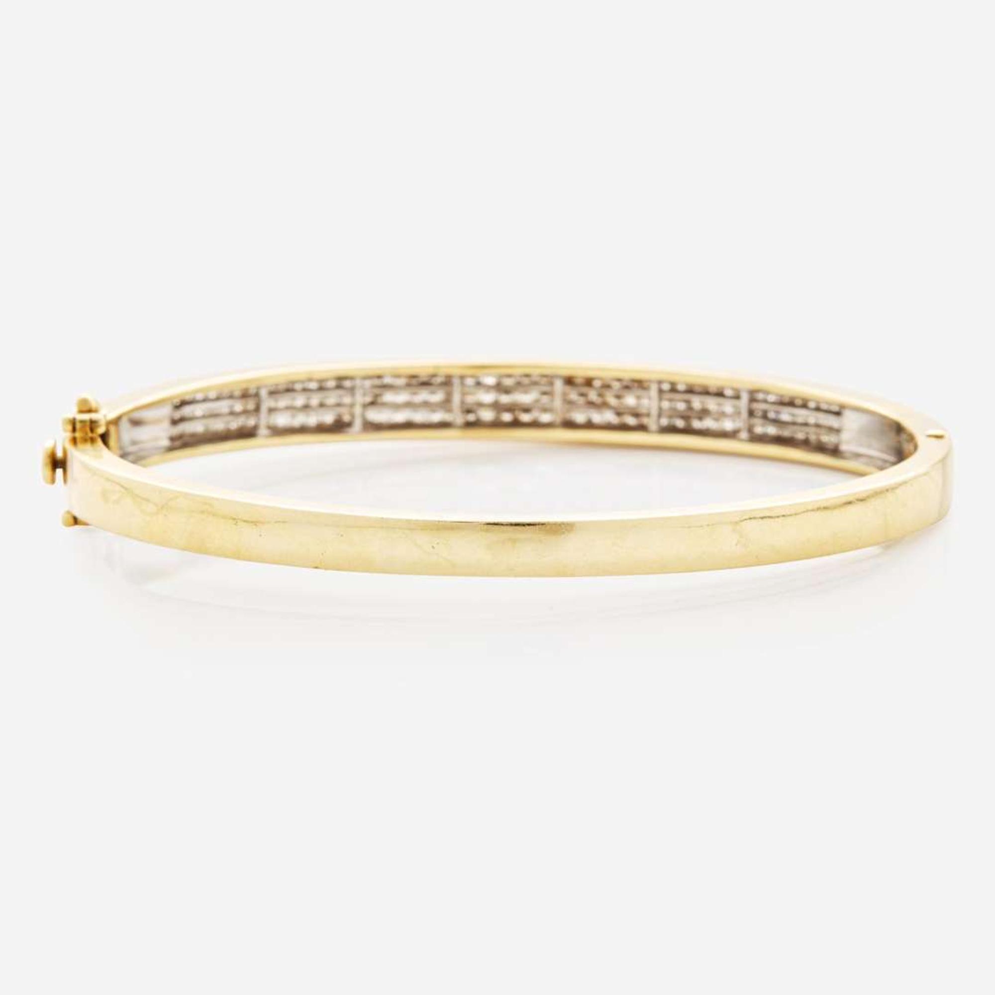 A 14K Yellow Gold and Diamond Bangel