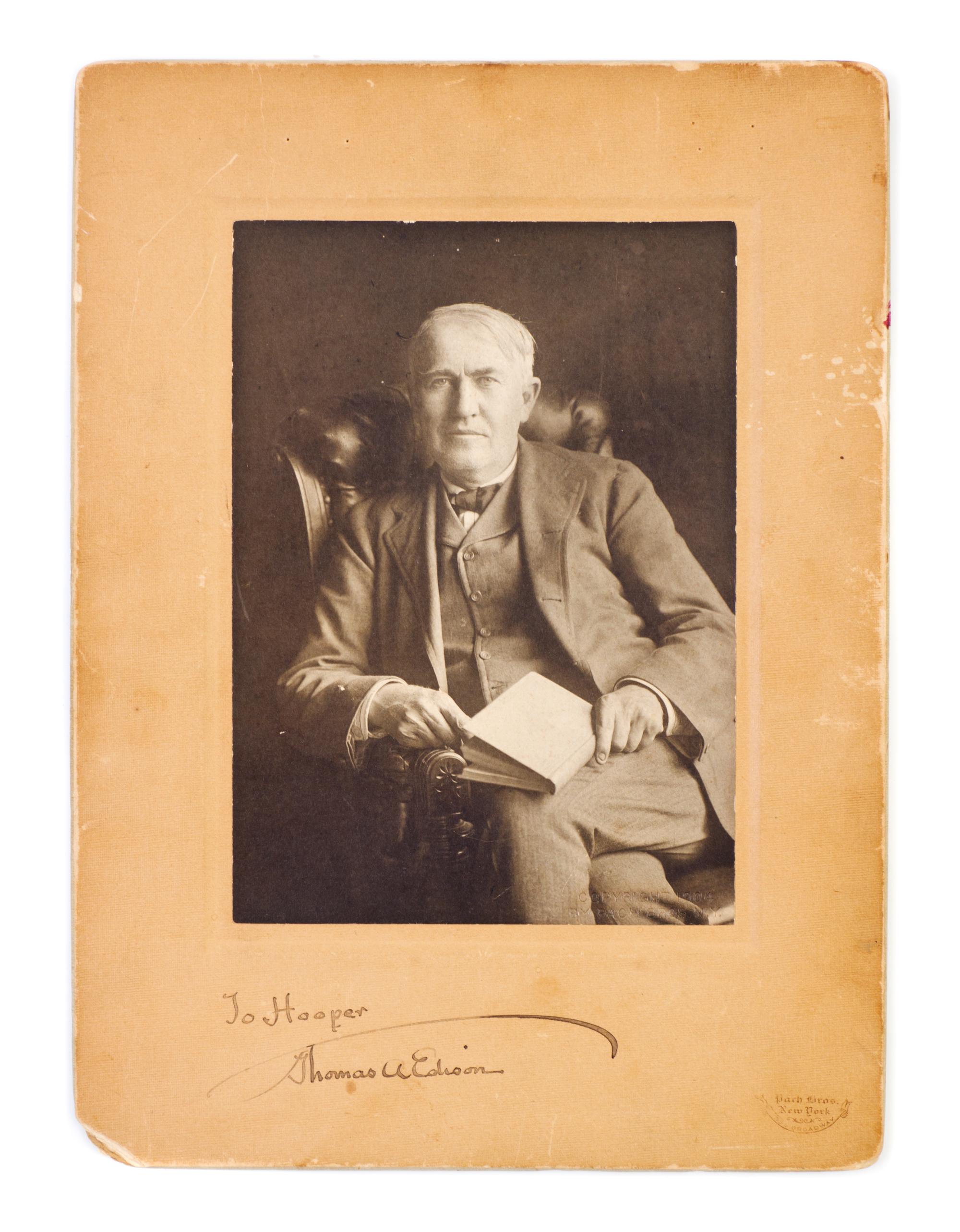 EDISON, THOMAS. Original black and white portrait photograph signed and inscribed ("To Hooper / Thomas A. Edison").