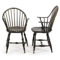 A Pair of Black-Painted Continuous Arm Windsor Chairs