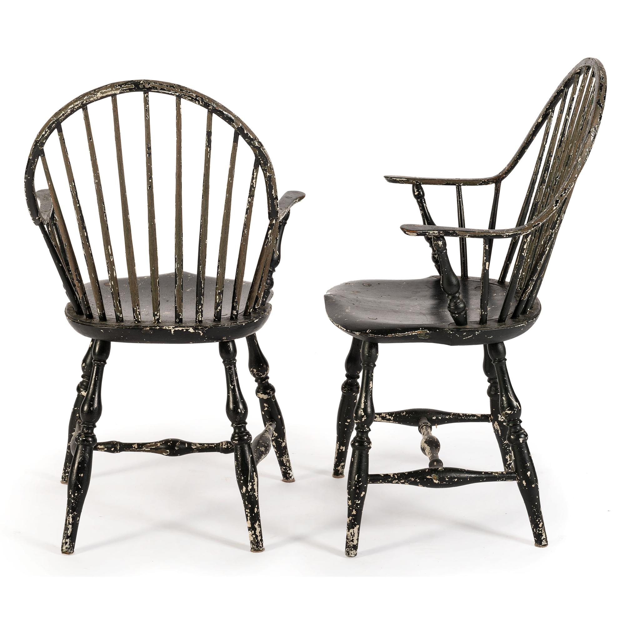 A Pair of Black-Painted Continuous Arm Windsor Chairs