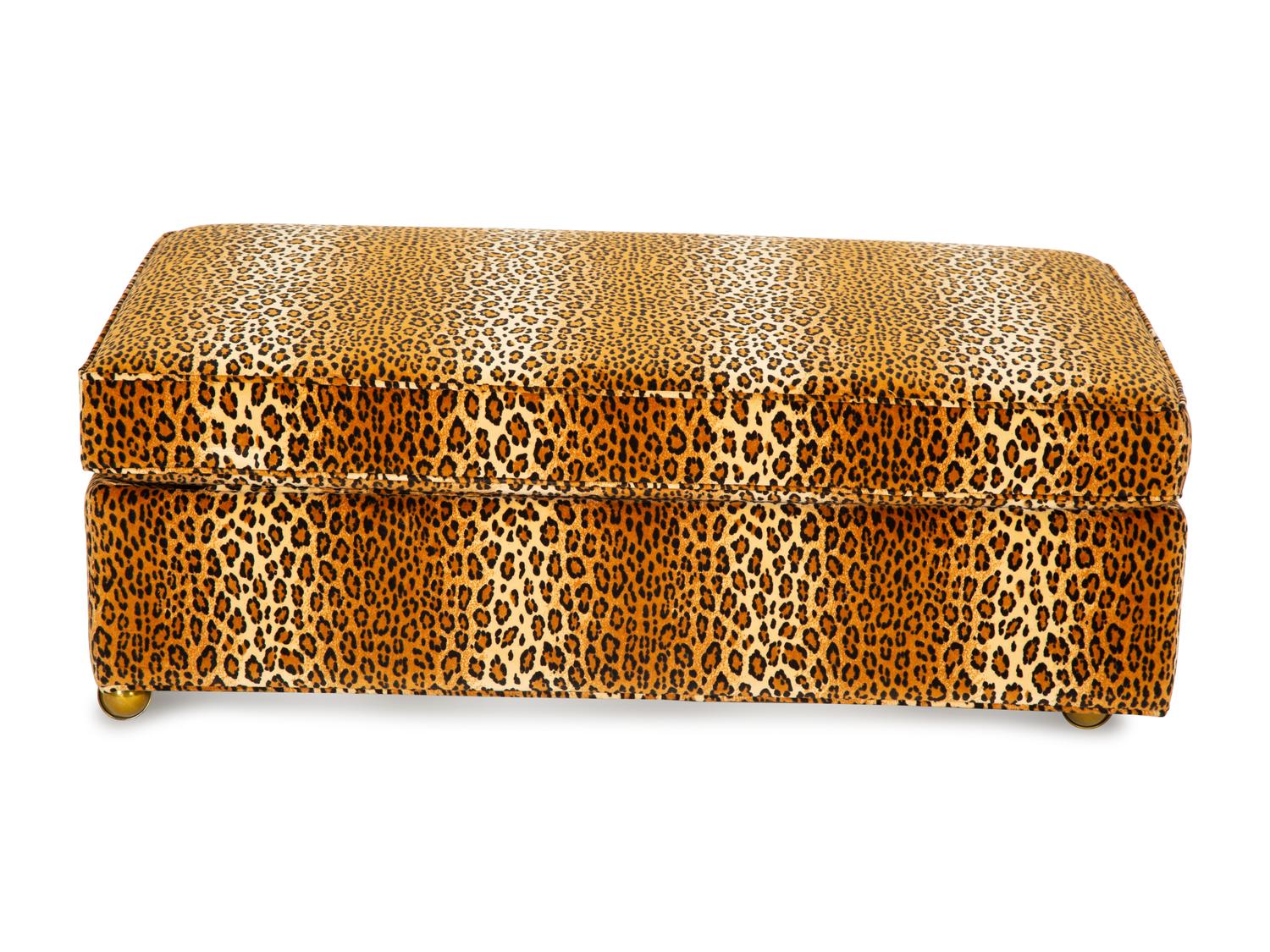 A Carlye Cheetah Print Upholstered Convertible Ottoman
