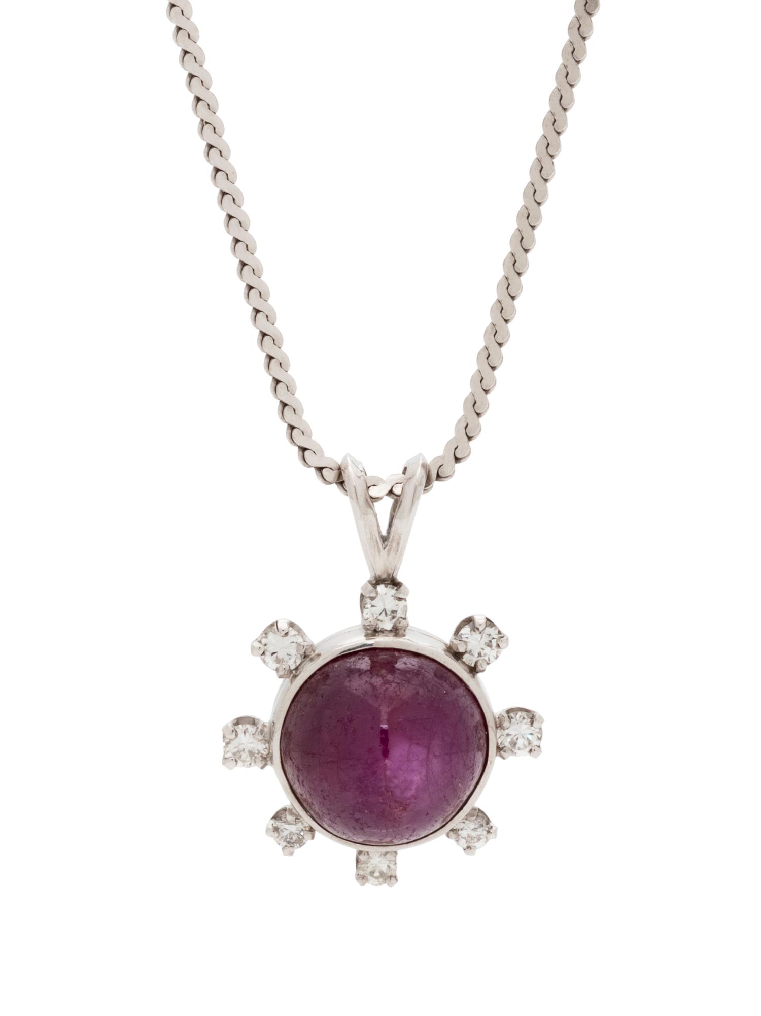 A Platinum, Star Ruby and Diamond Pendant,
