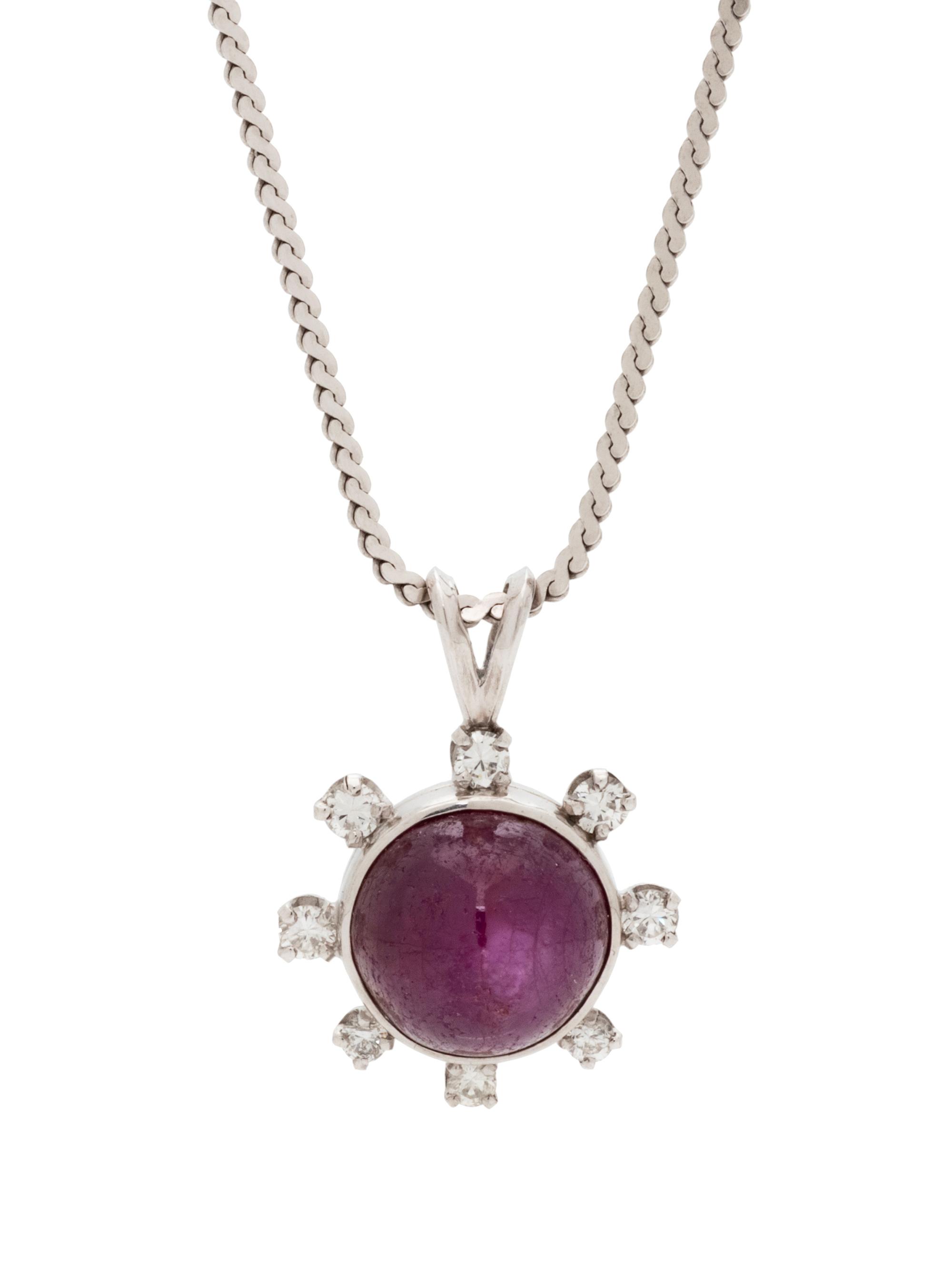 A Platinum, Star Ruby and Diamond Pendant,