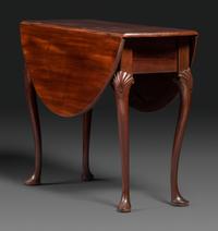 A Queen Anne Shell-Carved Mahogany Drop-Leaf Table