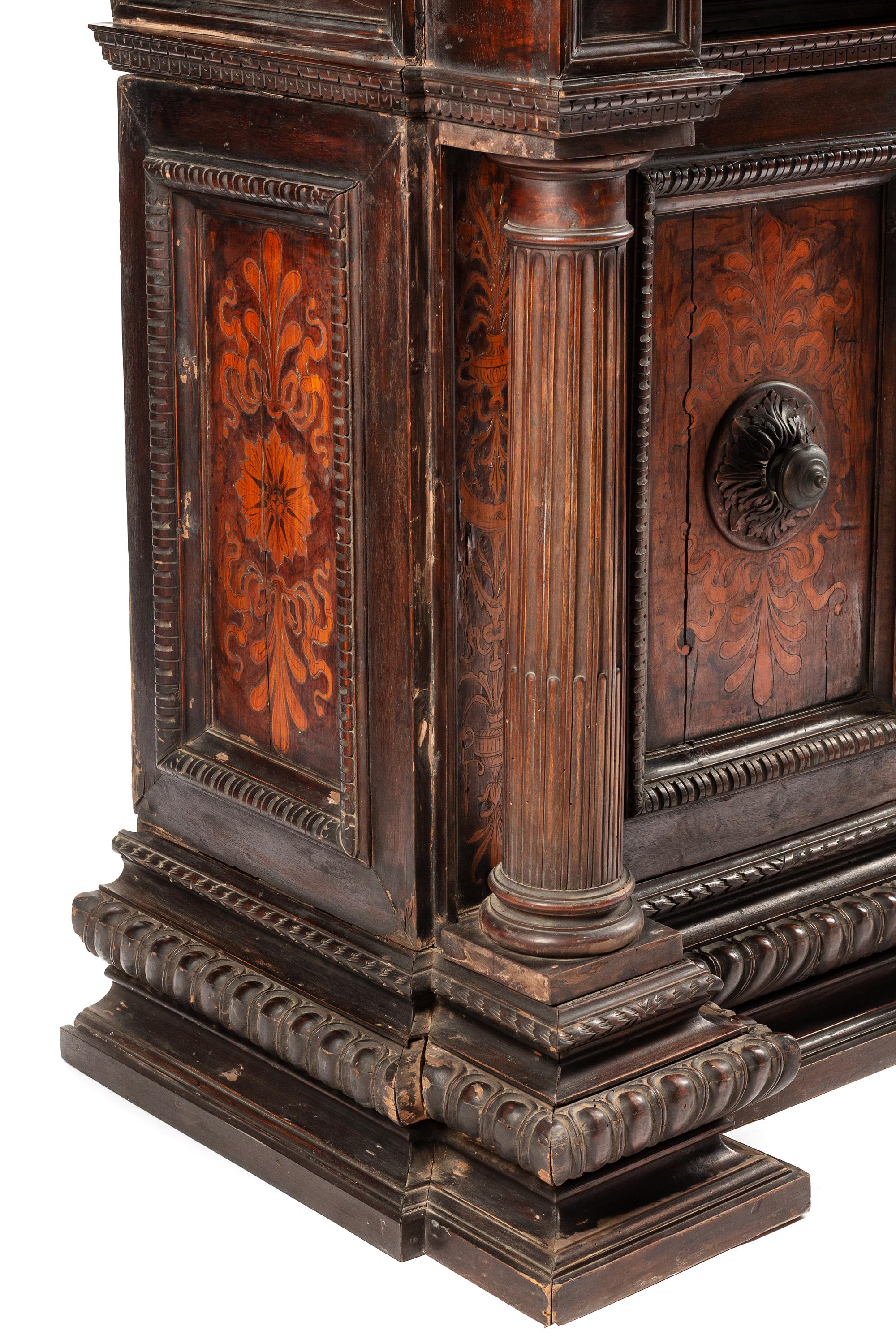 An Italian Baroque Walnut and Marquetry Cabinet