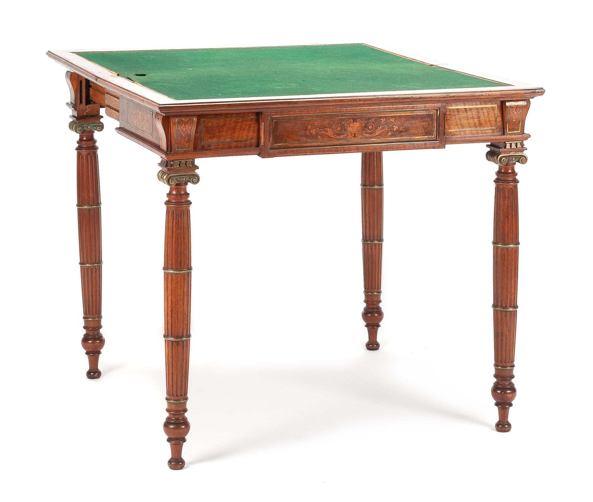 A French Bronze Mounted Mahogany and Marquetry Flip-Top Game Table Height 31 x width 33 3/4 x depth 18 inches. — 19TH CENTURY
