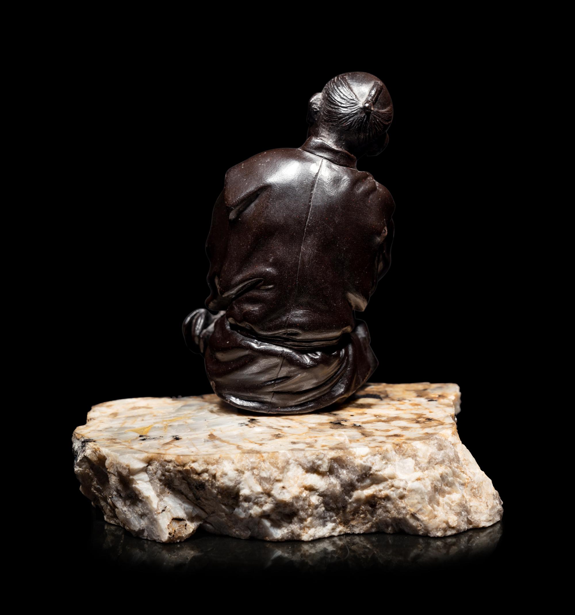 A Bronze Okimono of an Elderly Man