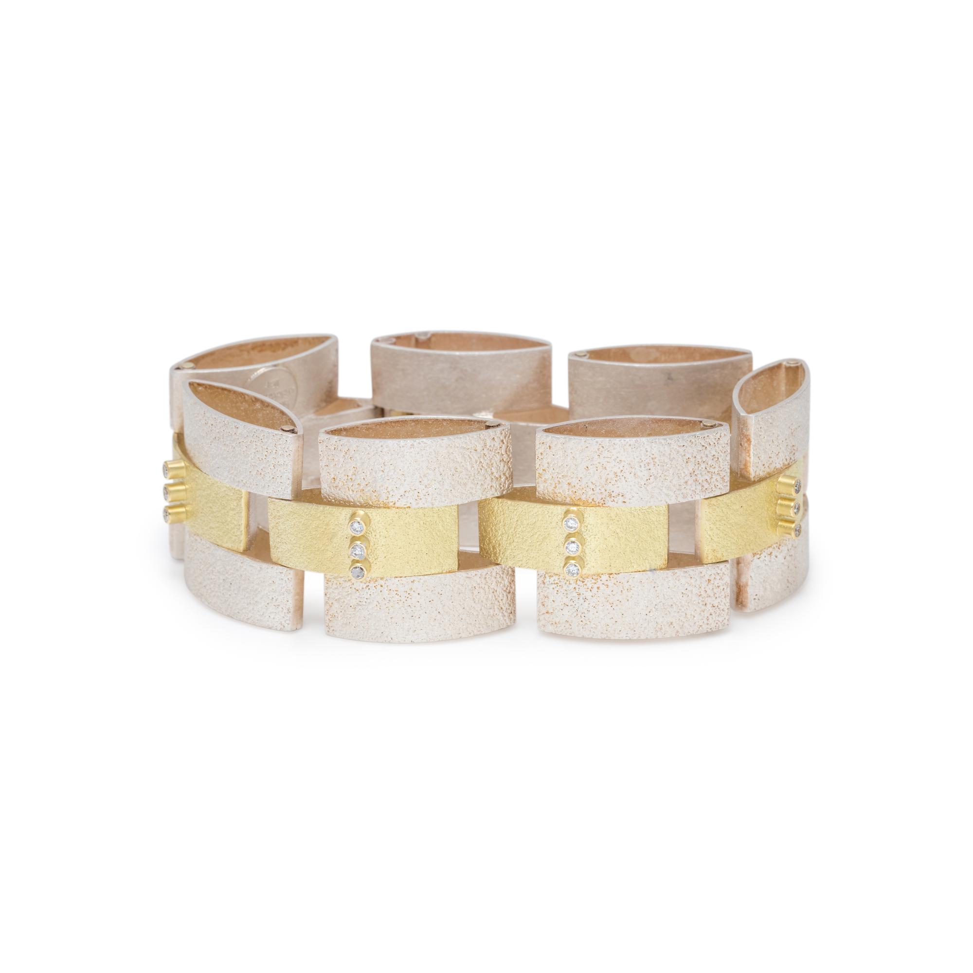YELLOW GOLD, STERLING SILVER AND DIAMOND BRACELET