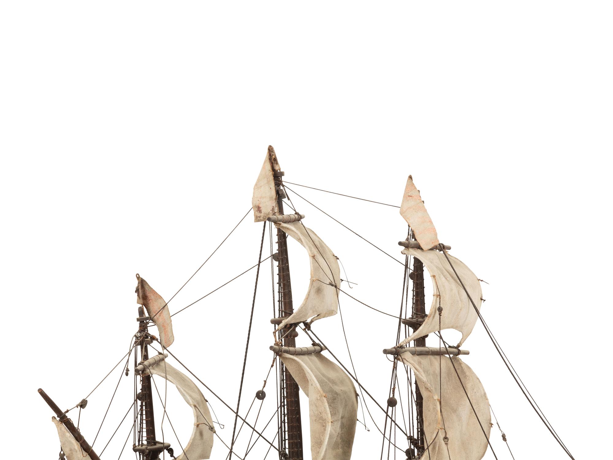 An Italian Painted and Parcel Gilt Model of a Galleon with Painted Cotton Sails
