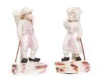 A Pair of Belleek Belgian Hawker Figures, Height of first 6 5/8 inches.