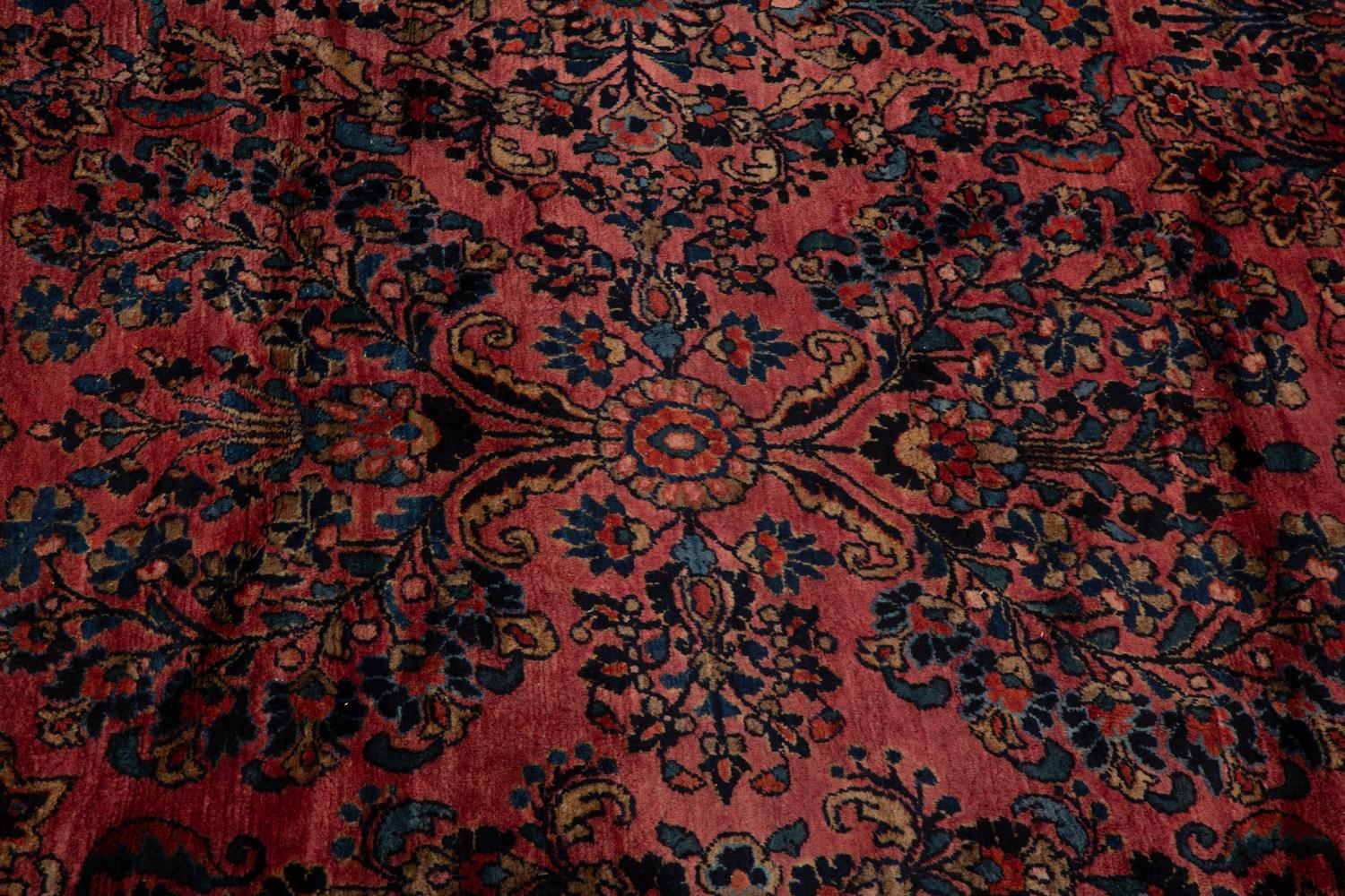 A Sarouk Wool Rug — 20th Century
