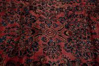A Sarouk Wool Rug — 20th Century