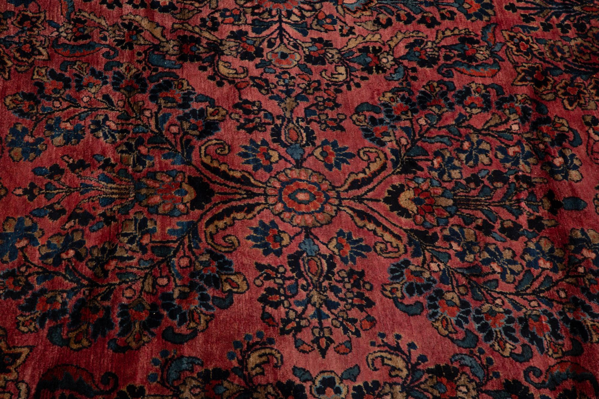 A Sarouk Wool Rug — 20th Century