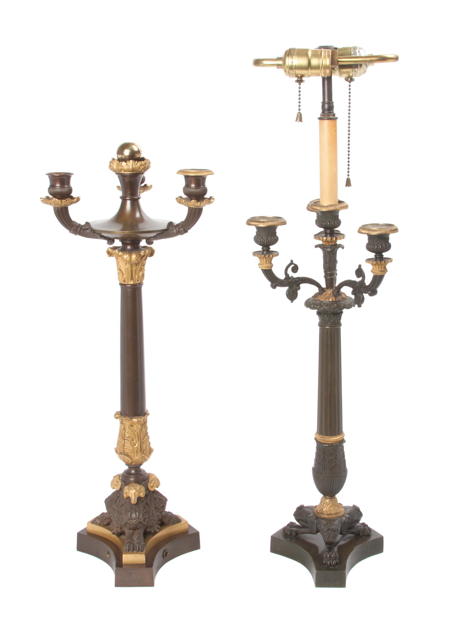 An Empire Gilt and Patinated Bronze Four-Light Candelabra Height of first 26 1/2 inches.