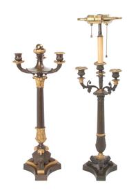 An Empire Gilt and Patinated Bronze Four-Light Candelabra Height of first 26 1/2 inches.