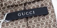 A Group of Three Gucci Neckties,