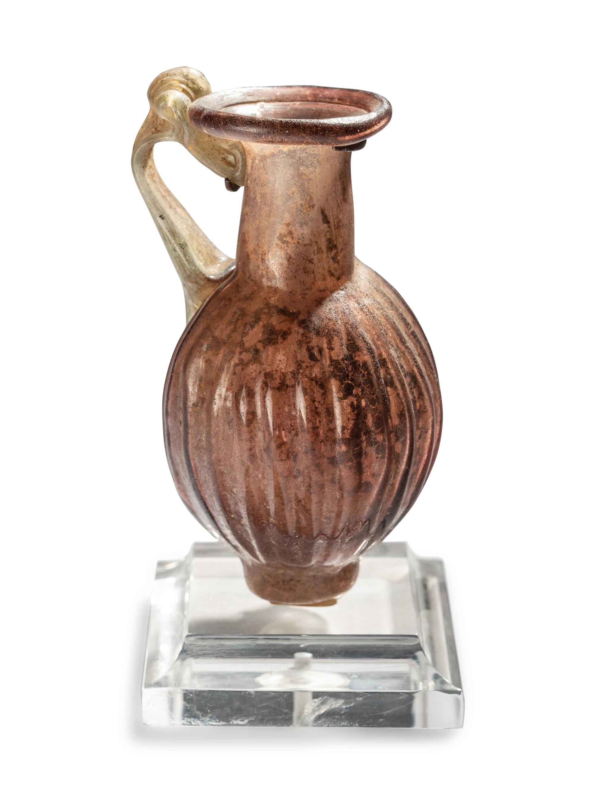 A Roman Purple Glass Jug