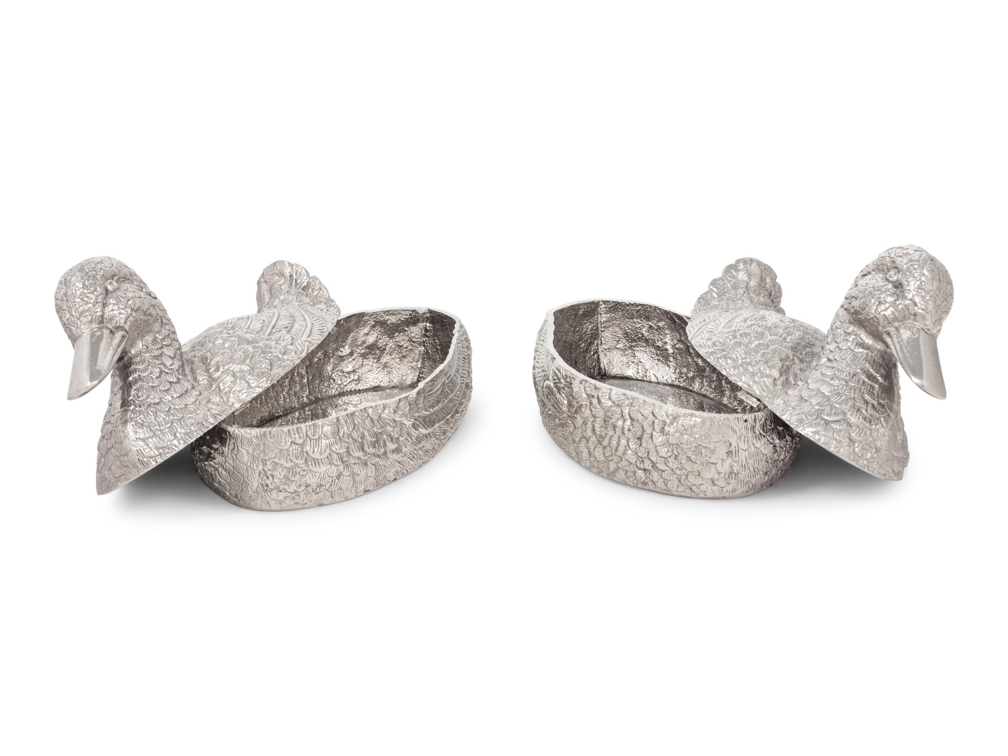 A Pair of Silvered Metal Duck-Form Boxes