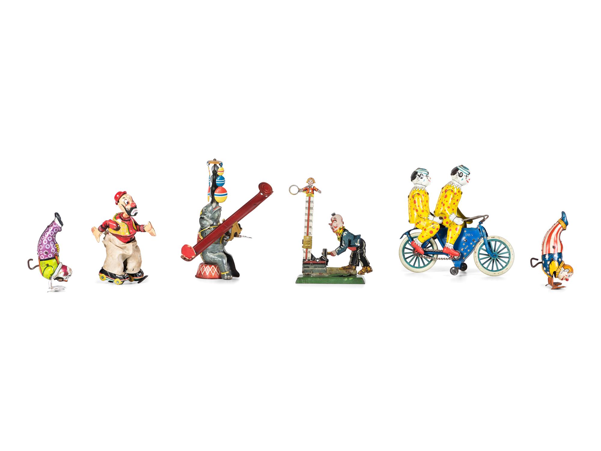 Six Tin Clown and Circus Toys