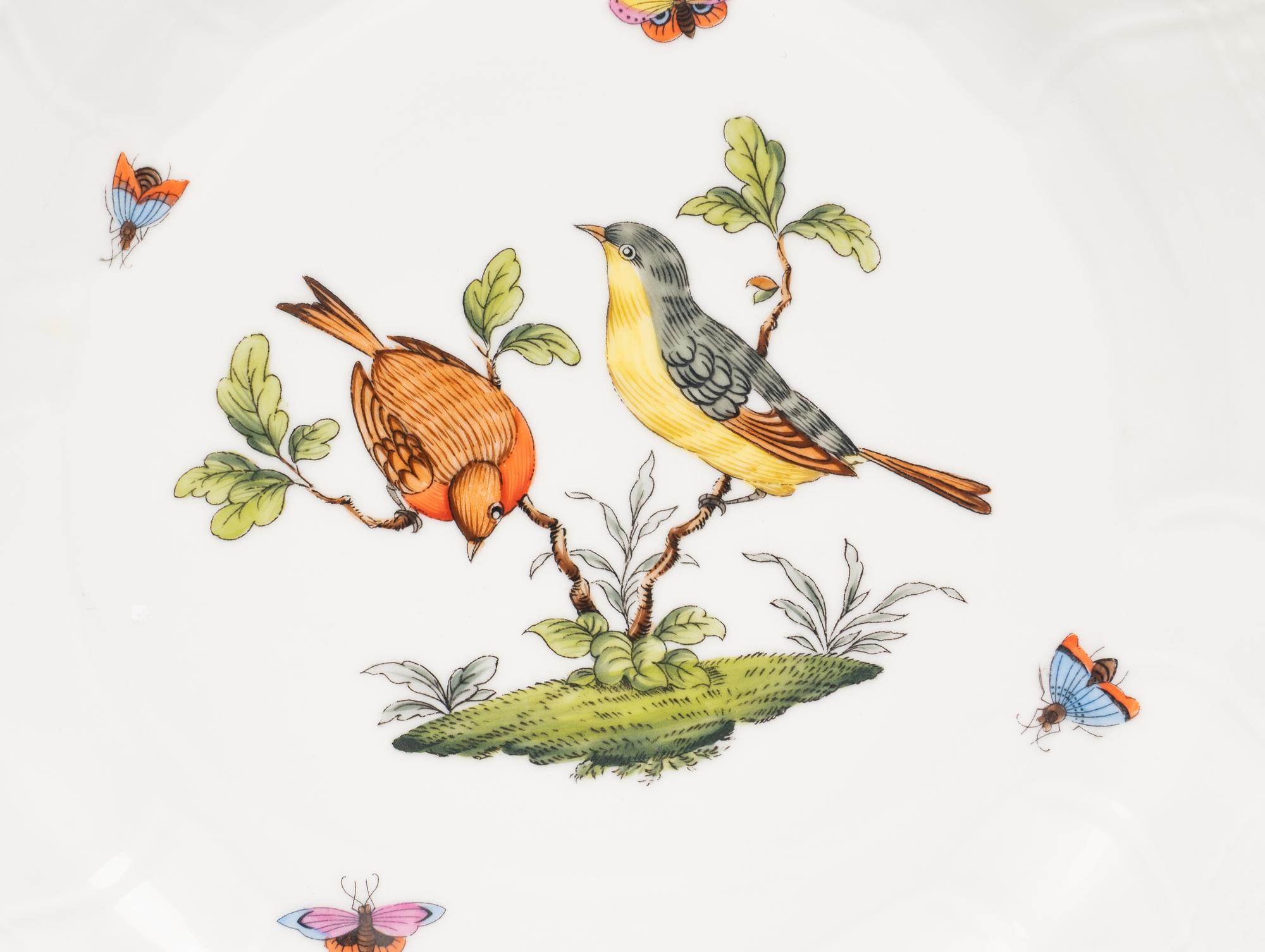 A Set of Eight Herend Rothschild Bird Porcelain Dinner Plates