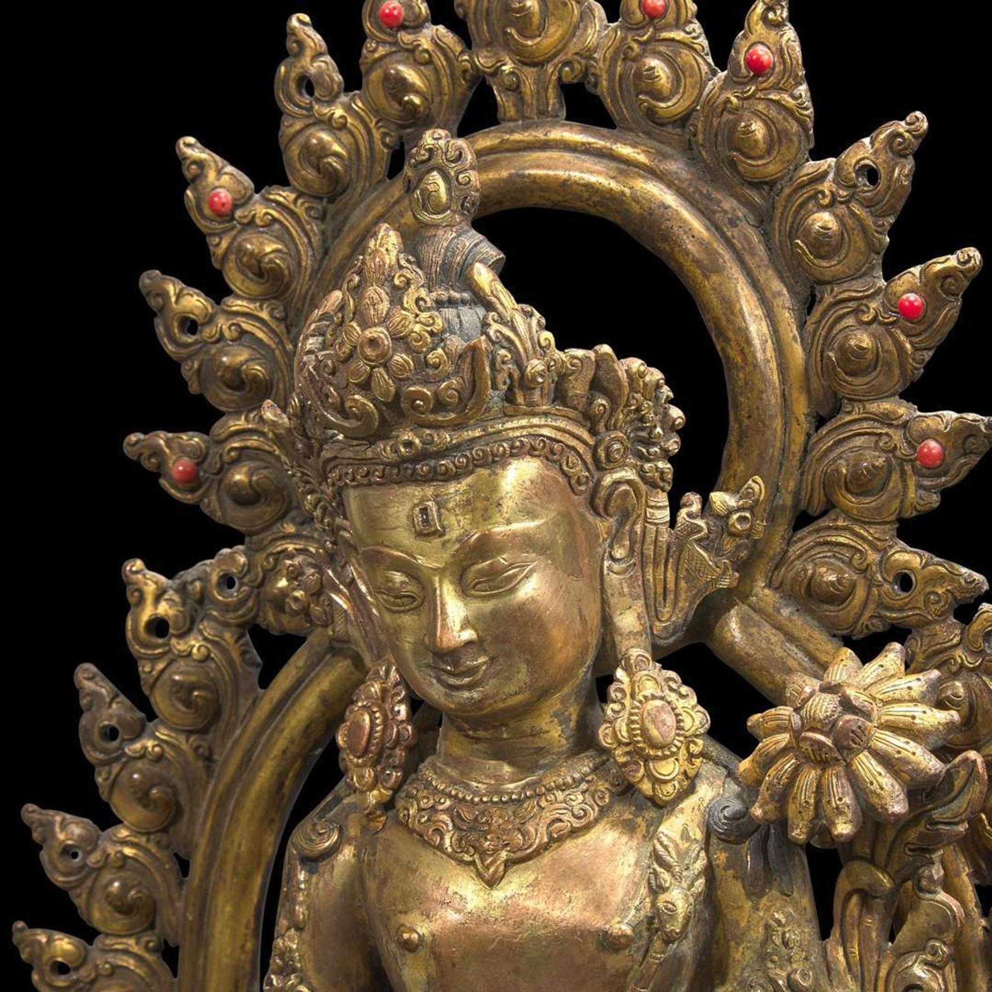 A Sino-Tibetan or Nepalese gilt bronze figure of Padmapani 藏传或尼泊尔铜鎏金圣观世音造像 19th century ????