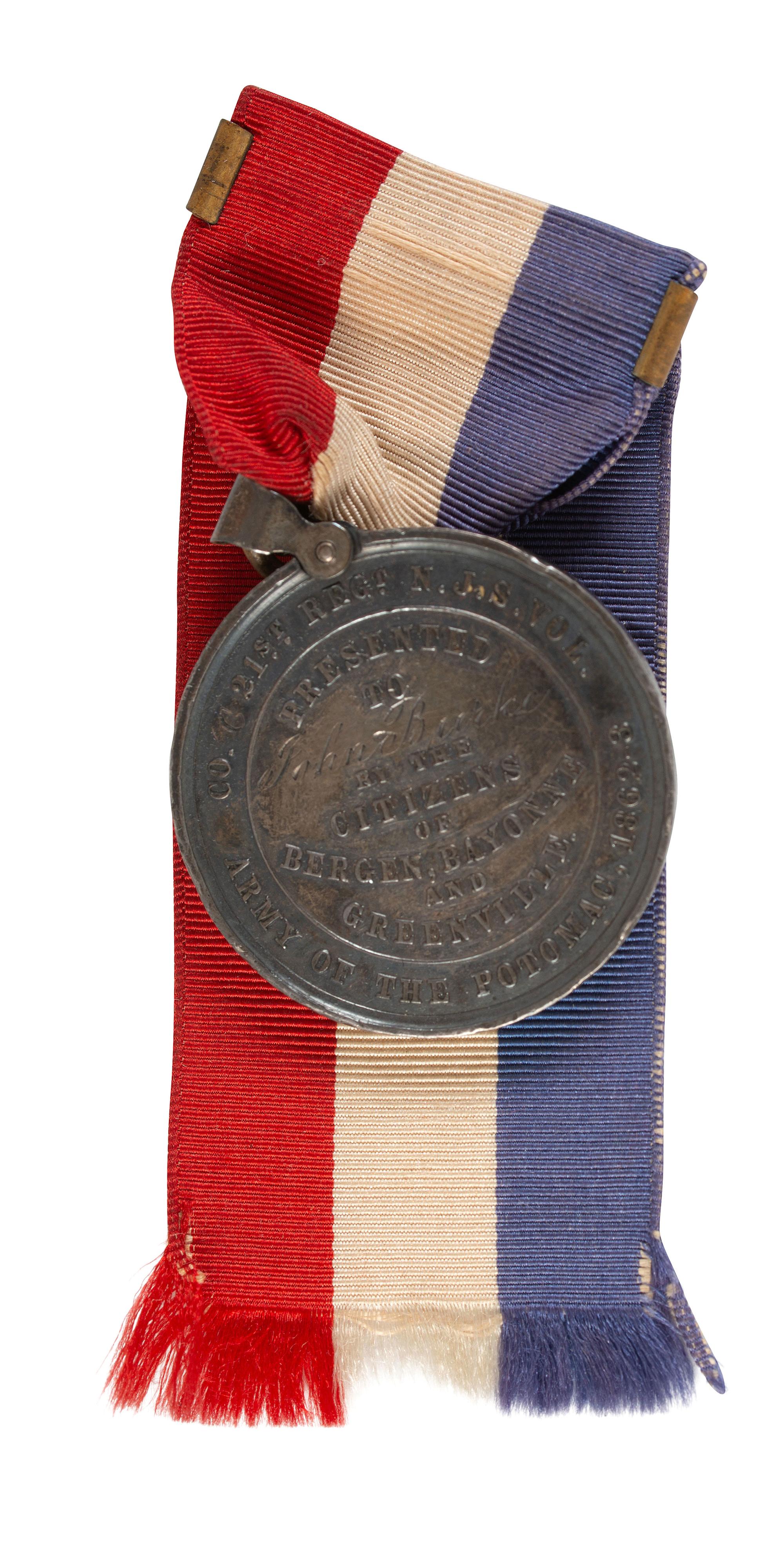 [CIVIL WAR]. New Jersey Army of the Potomac presentation medal identified to John Burke, Company C, 21st New Jersey Volunteers.