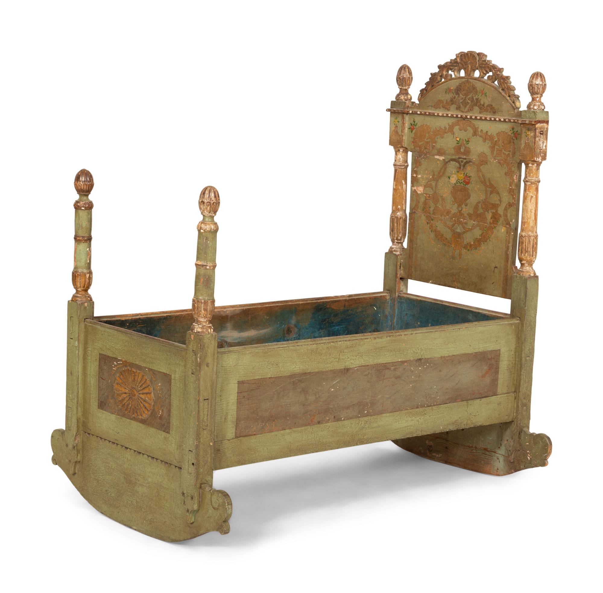 A Venetian Painted and Parcel Gilt Rocking Cradle
