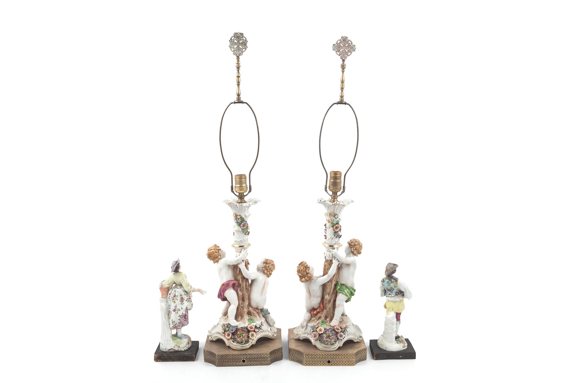 A Pair of Continental Porcelain Figural Lamps