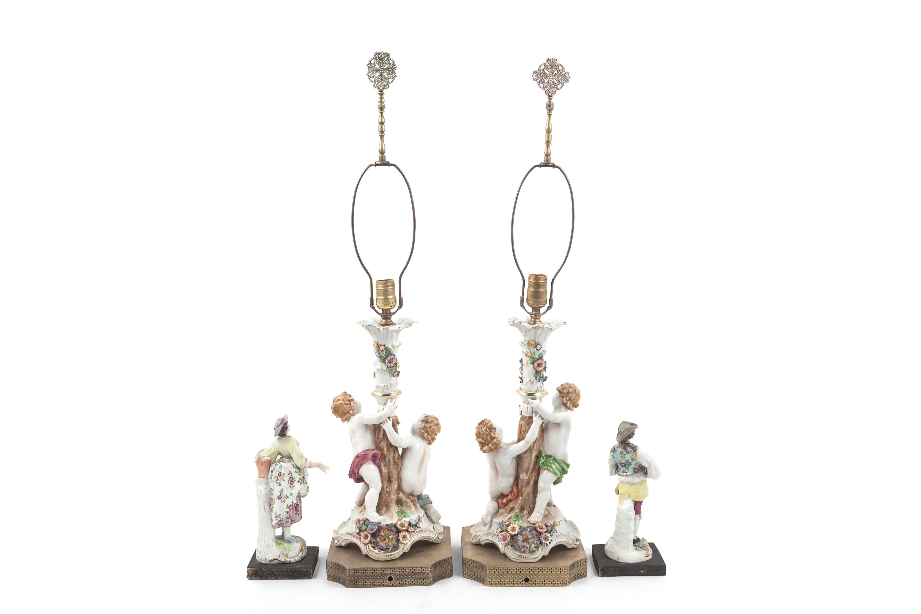 A Pair of Continental Porcelain Figural Lamps