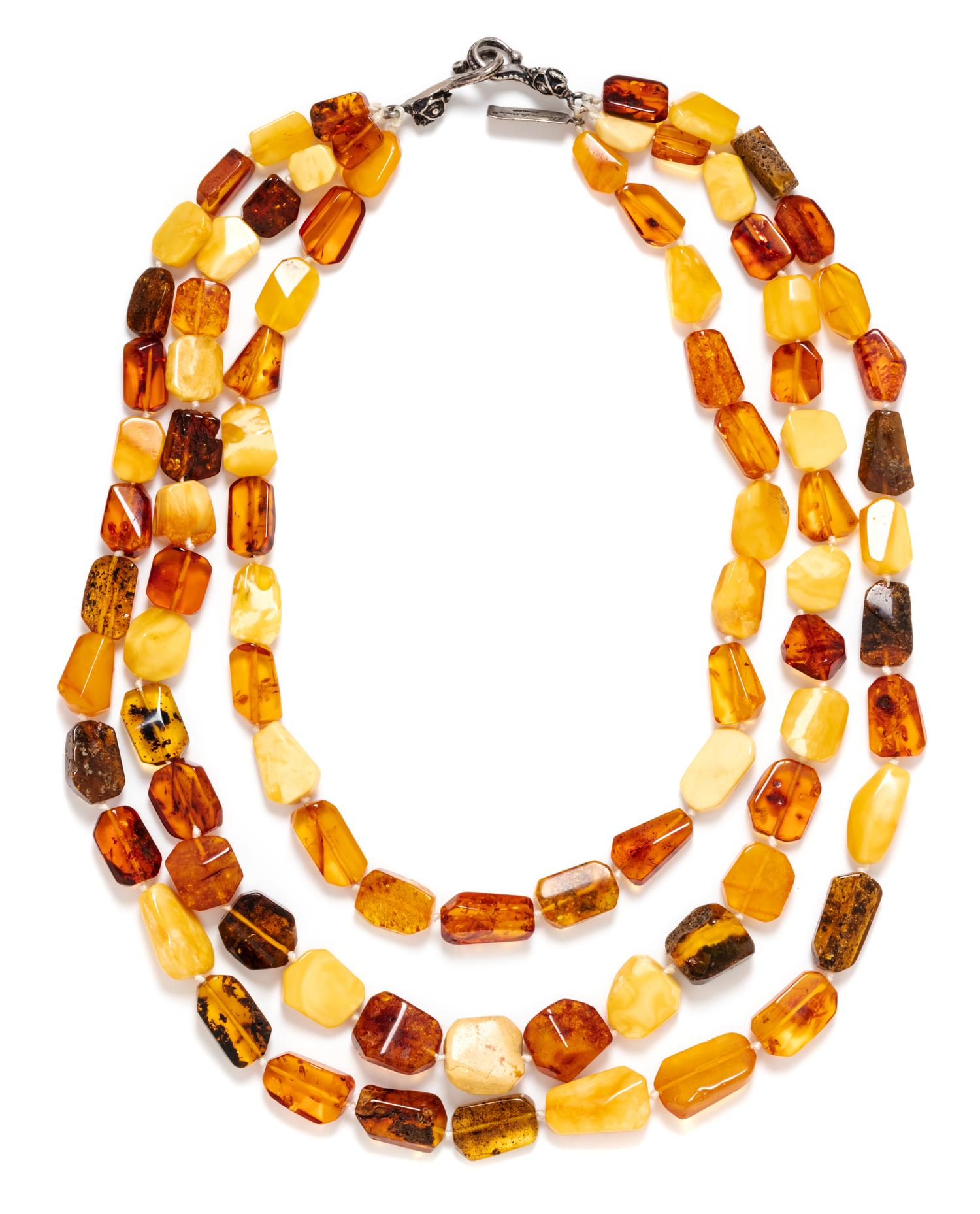 A Sterling Silver and Amber Multistrand Bead Necklace, Rebecca Collins,