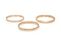 COLLECTION OF YELLOW GOLD, SAPPHIRE, AND DIAMOND BANGLE BRACELETS
