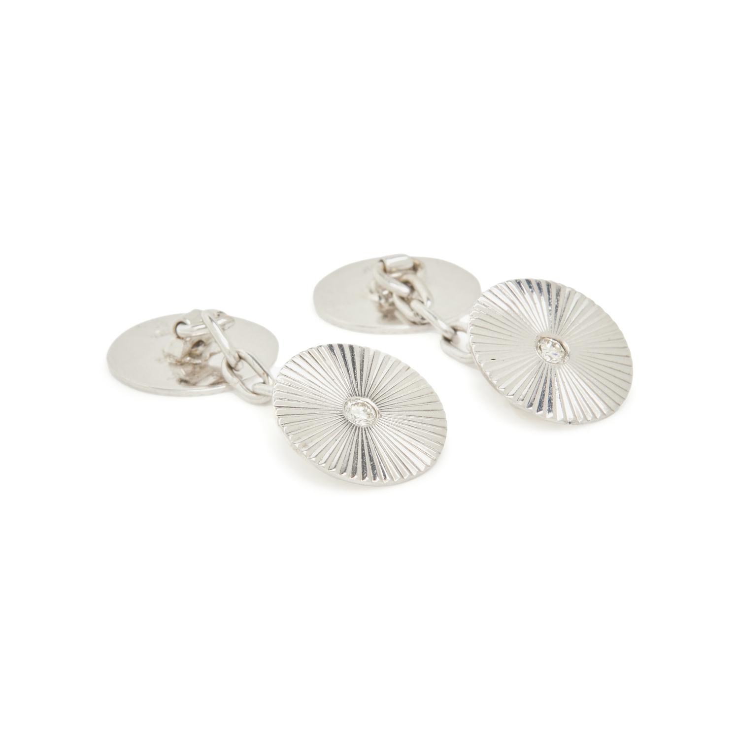 CARTIER, WHITE GOLD AND DIAMOND CUFFLINKS
