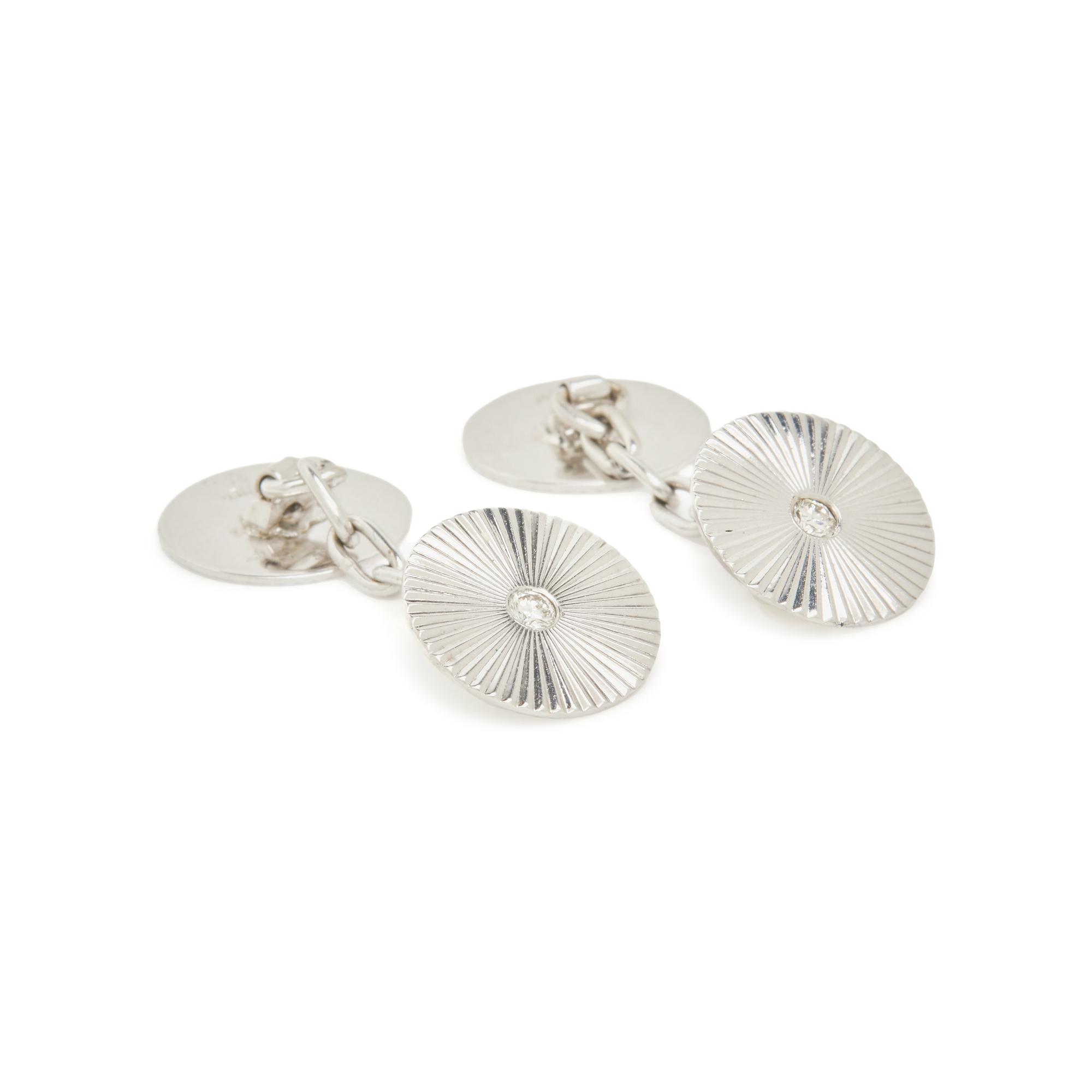 CARTIER, WHITE GOLD AND DIAMOND CUFFLINKS