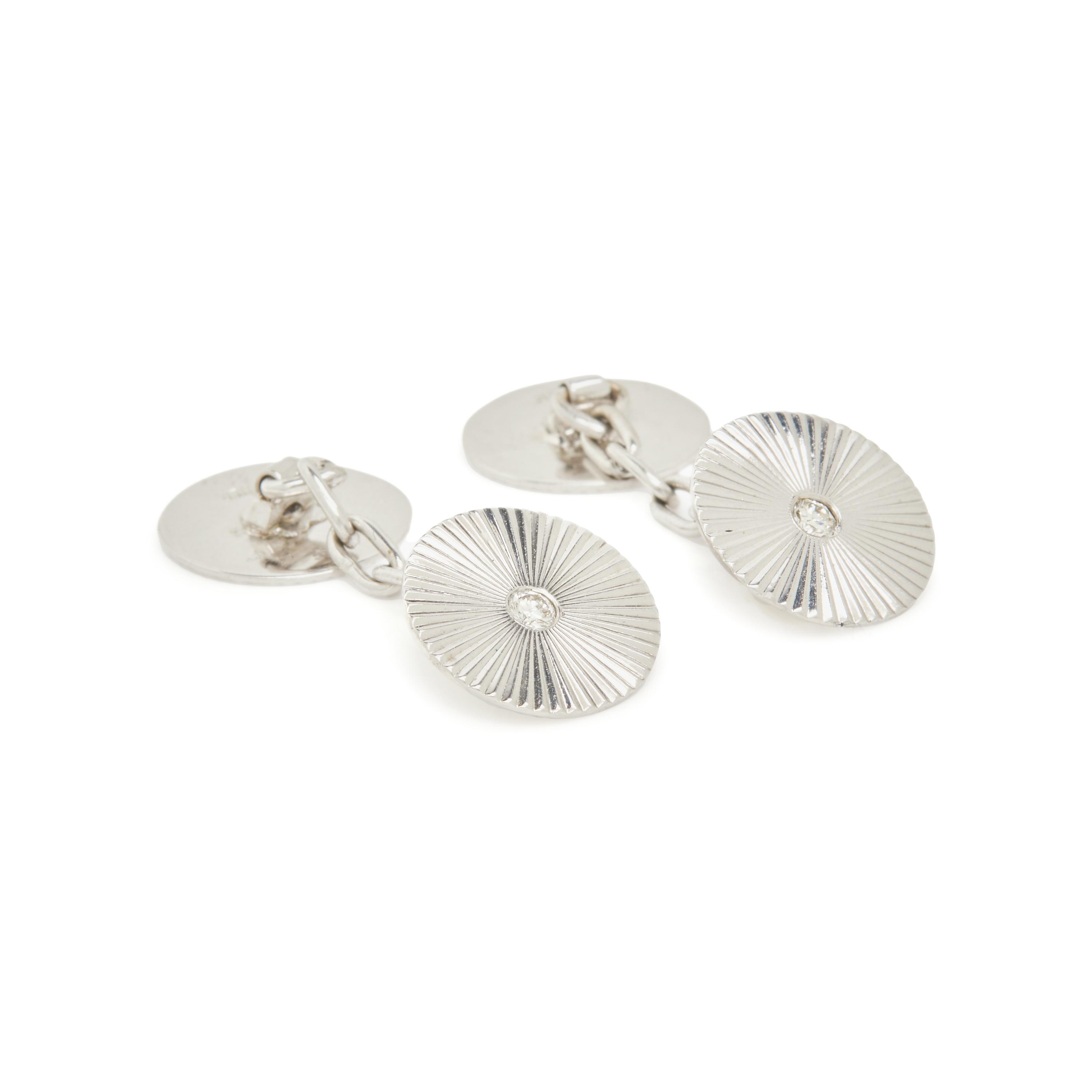 CARTIER, WHITE GOLD AND DIAMOND CUFFLINKS