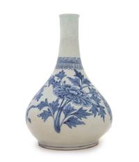 A Korean Blue and White Porcelain Bottle Vase Height 9 3/4 inches.