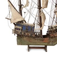 An Italian Painted and Parcel Gilt Model of a Galleon with Painted Cotton Sails