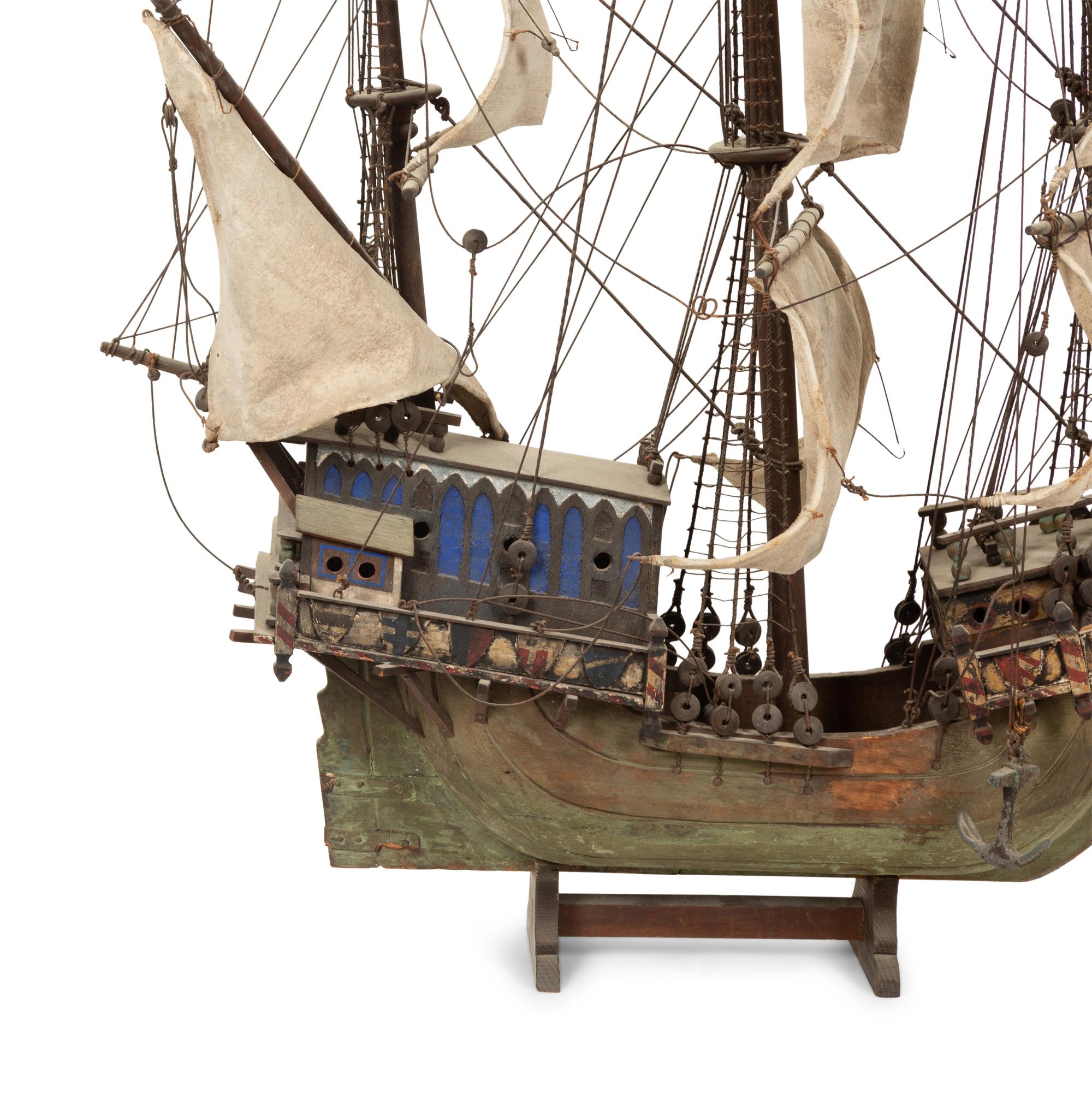 An Italian Painted and Parcel Gilt Model of a Galleon with Painted Cotton Sails