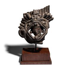 A Zapotec Terracotta Figure of a God