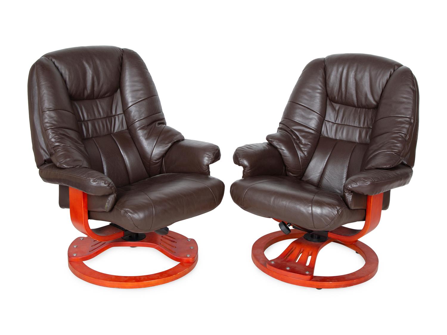 A Pair of Modern Leather Lounge Chairs with Ottomans — 20TH CENTURY