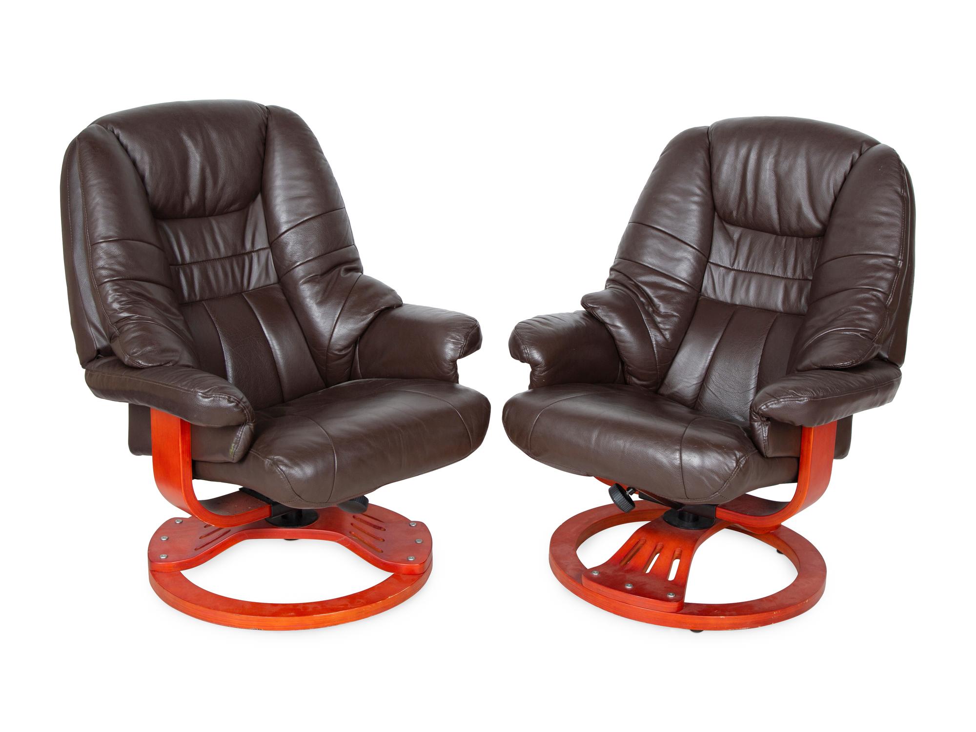 A Pair of Modern Leather Lounge Chairs with Ottomans — 20TH CENTURY