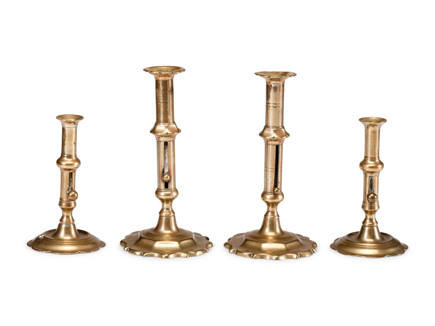 Two Pairs of English Brass Adjustable Candlesticks