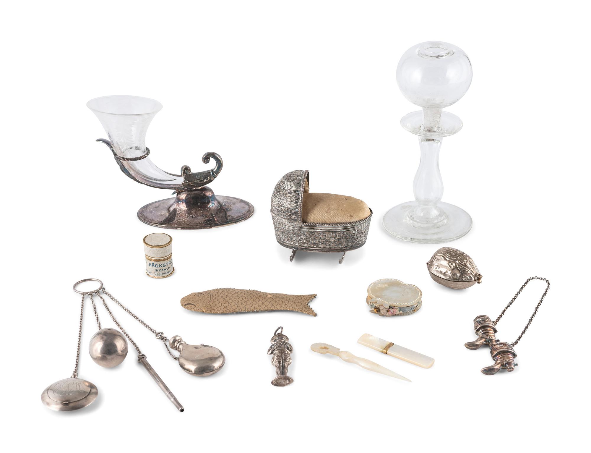 A Group of Silver and Mother of Pearl Sewing Accessories