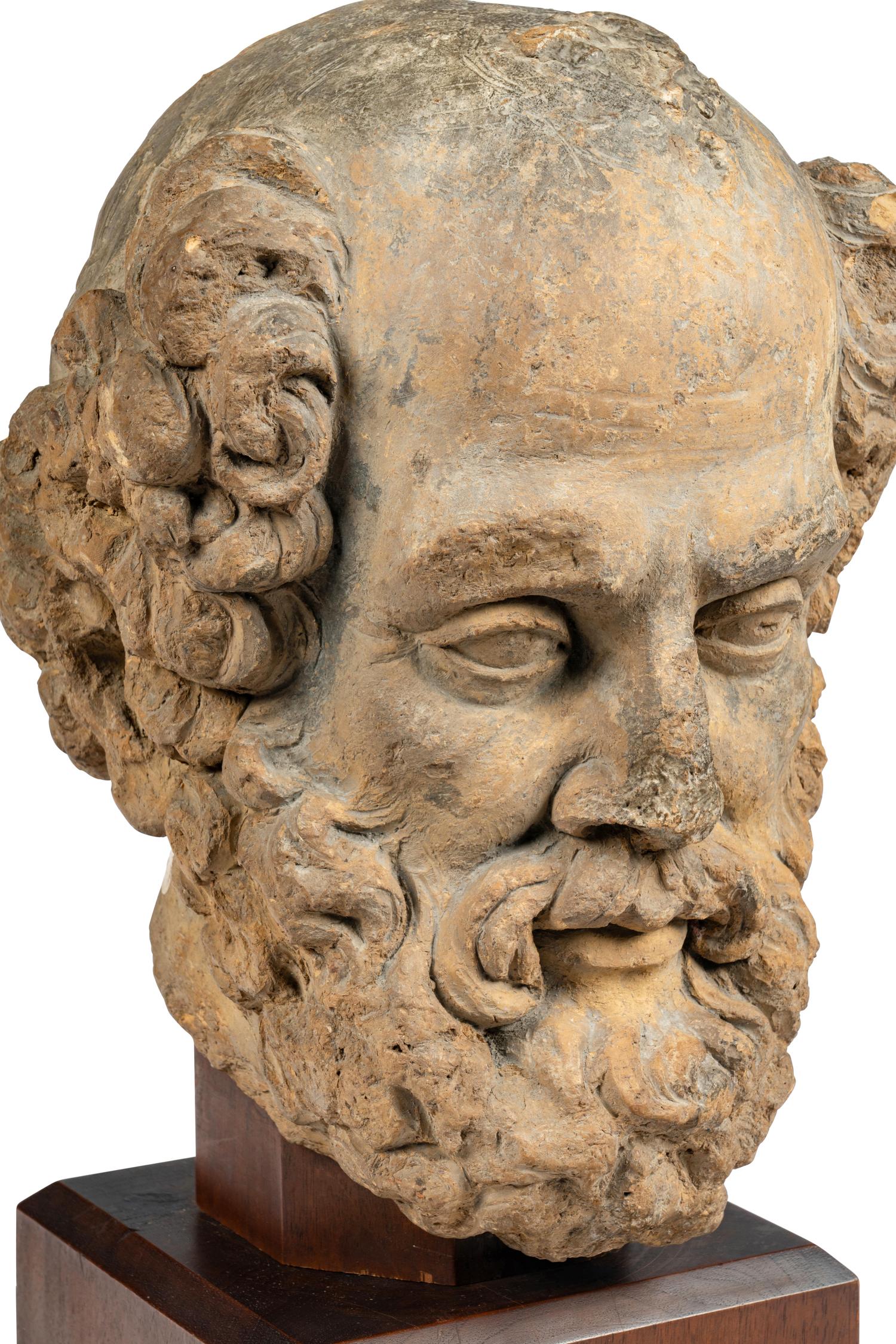 A Continental Terracotta Portrait Head of a Bearded Man