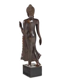 A Large Thai Bronze Figure of Walking Buddha