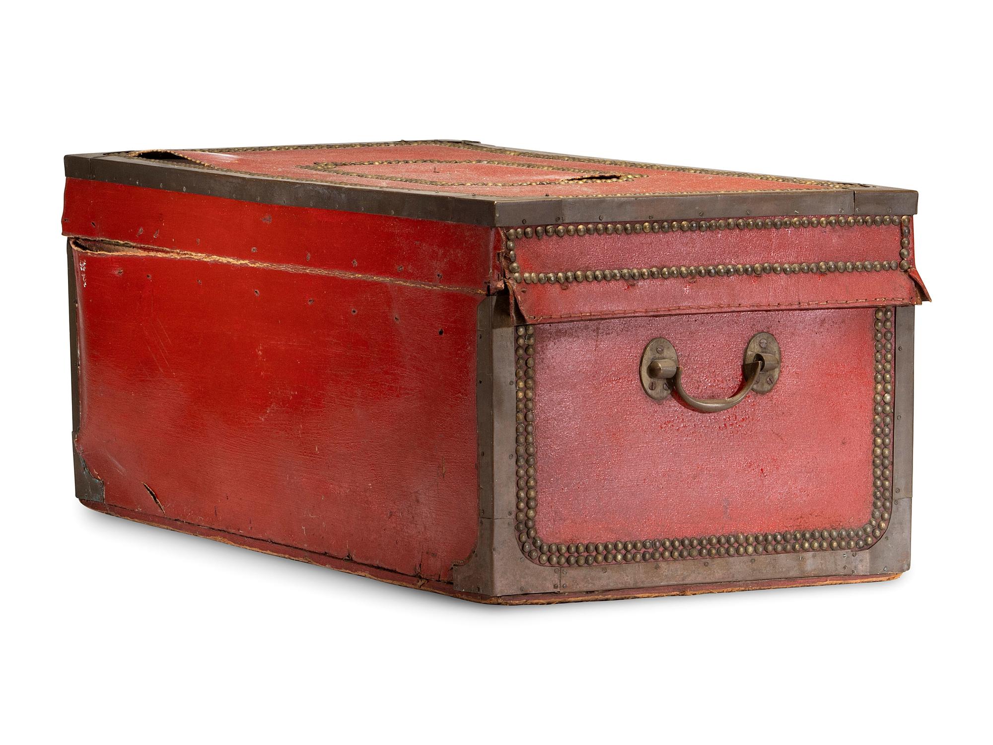 A China Trade Camphorwood Red Leather Clad and Brass Tack-Decorated Trunk