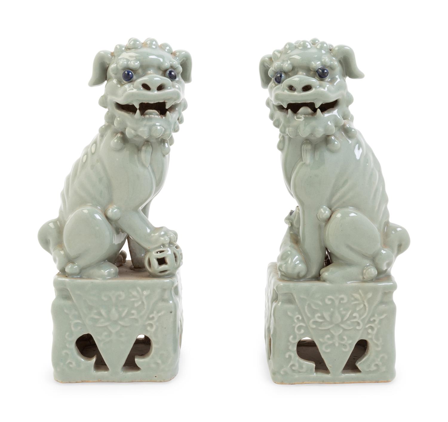 A Pair of Chinese Blue Glazed Porcelain Figures of Fu Lions